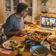 A family eats dinner together virtually